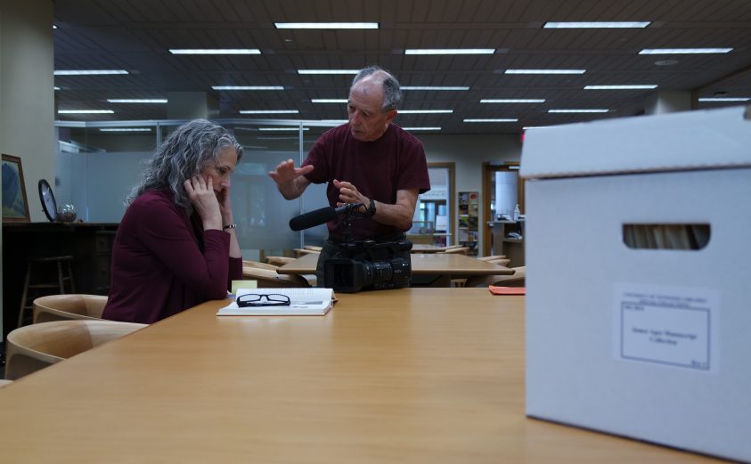 filmmaker speaking with special collections staffer