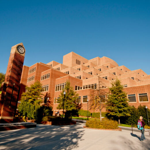 Exterior photograph of Hodges Library with T Libraries Logo