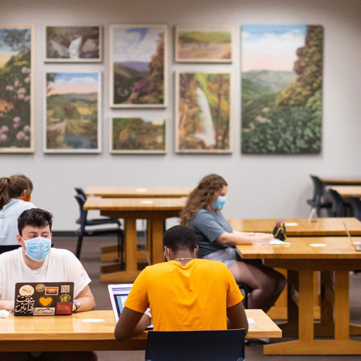 students in the miles reading room