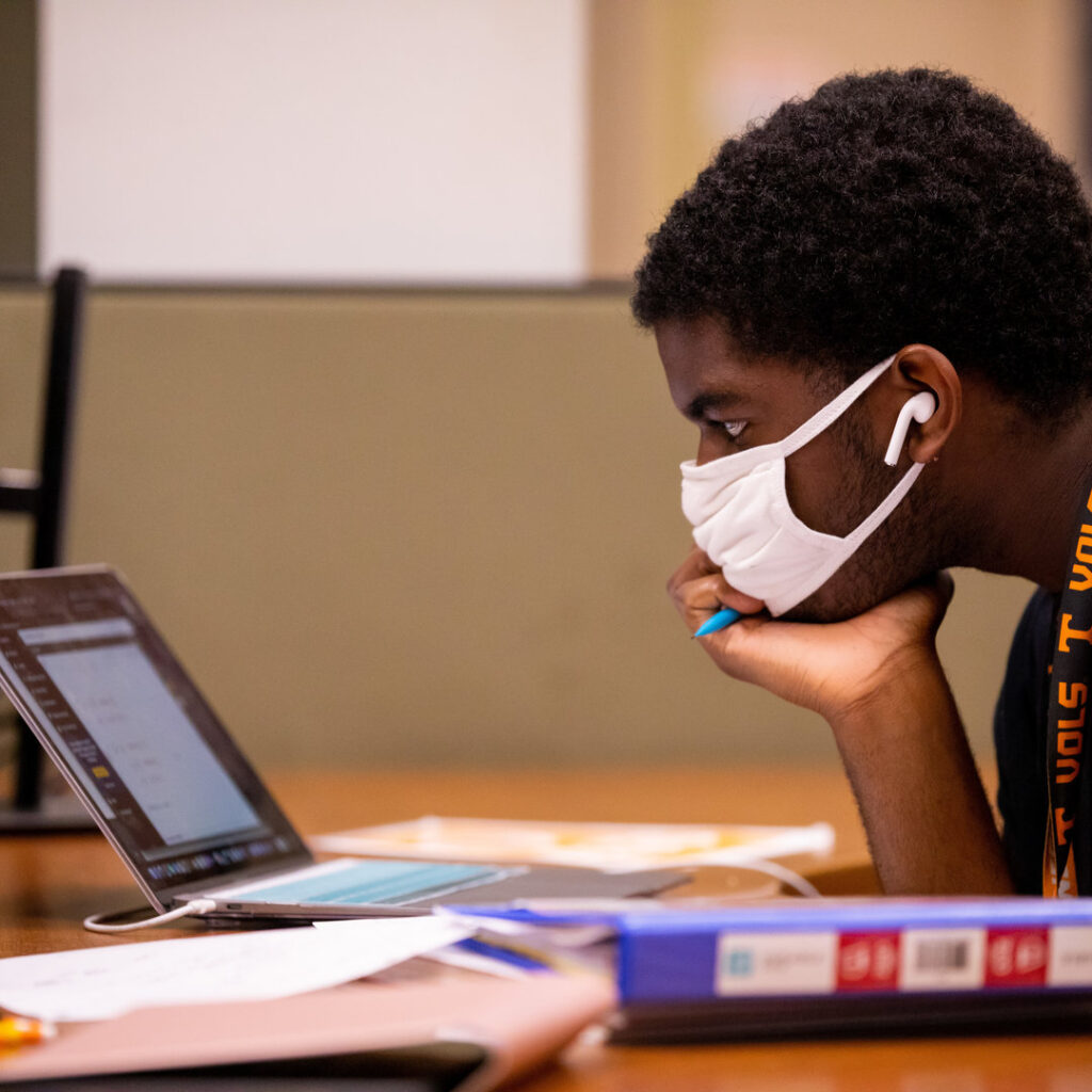 A graduate student learns about how UT Libraries can support their research