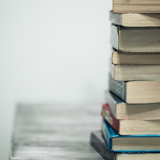 Photograph of a stack of 10 books