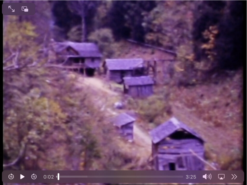 Image (cabins in the mountains) from "On Top of Old Smoky,” William Derris Film Collection, UT Libraries