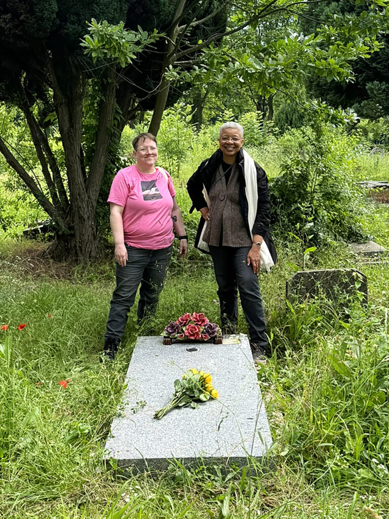 Kris Bronstad and Monique Wells visit Delaney’s grave in Thiais Cemetery.