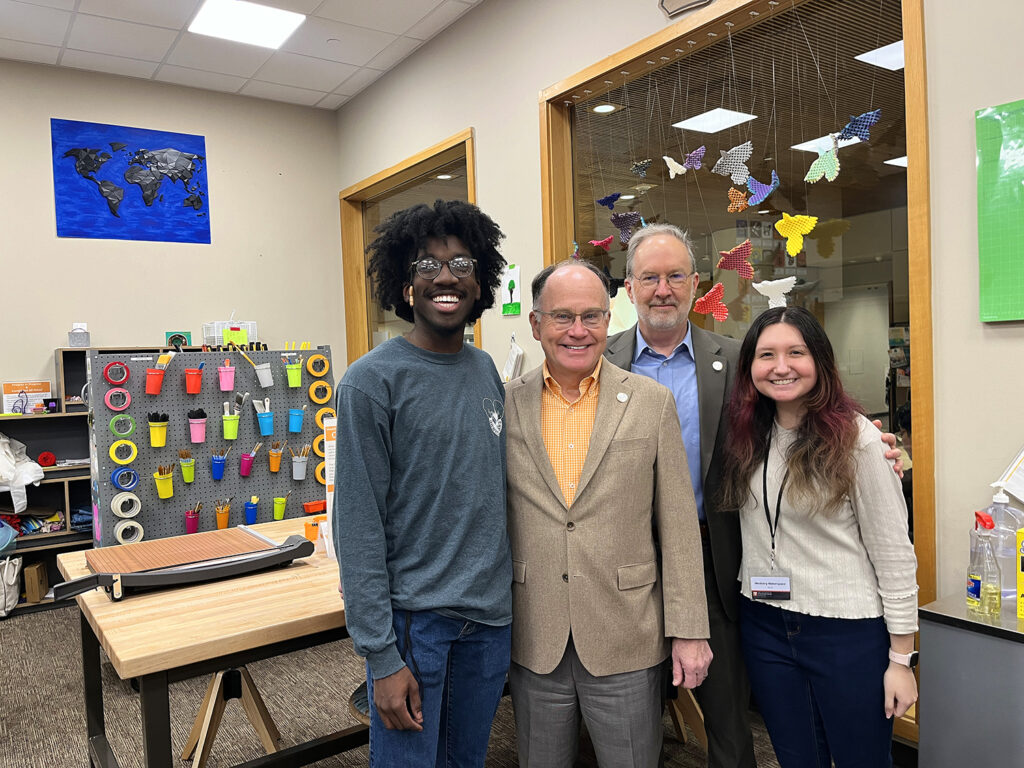 Bunker Medbery (second from left) with Makerspace student worker Caleb Napper, Dean of Libraries Steve Smith, and Makerspace student worker Sarah Pastor